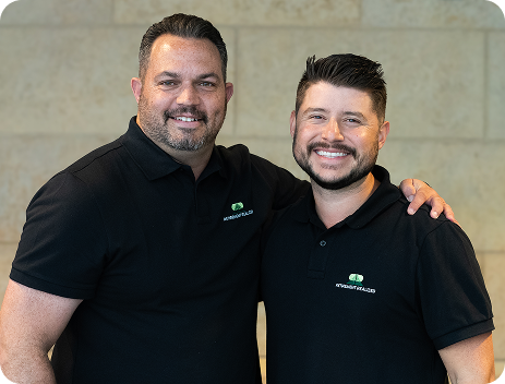 Two Retirement Realized producers together at a meeting